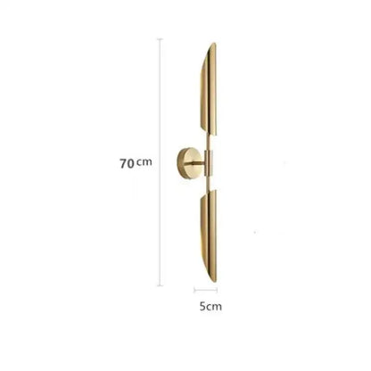 Modern gold led single head wall lamp with gold-toned sleek vertical arms and circular base for bedroom decorbites gold led