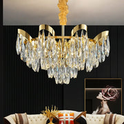 Modern gold led sunflower crystal ceiling chandelier with gold-toned frame and cascading crystal teardrop pendants for dining room decorbites led sunflower