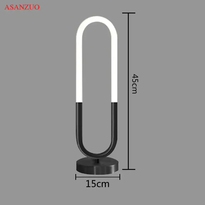 Modern black led u shape table lamp with sleek base and white light tube by asanzuo for bedroom decor
