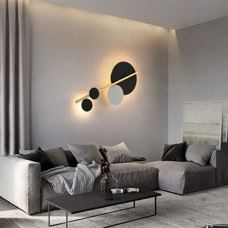 Modern gold led wall lamp with black white and gold circular fixtures on a sleek golden bar for bedroom decorbites led wall