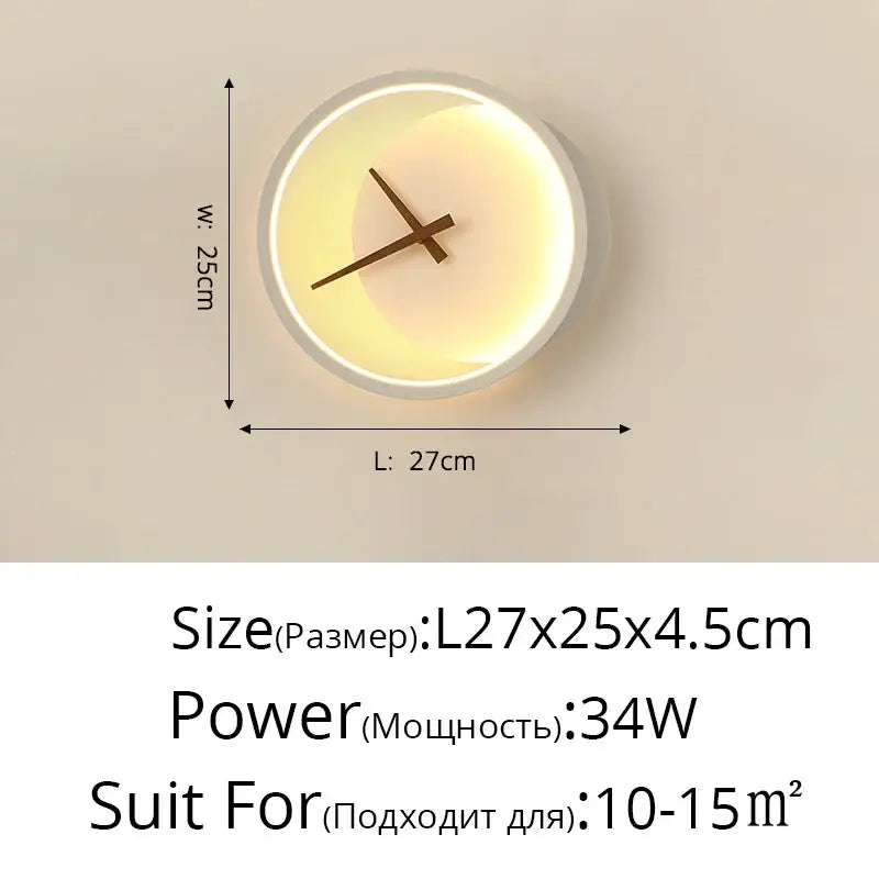 Modern gold led wall lamp clock with a warm glowing face and minimalist brown hands in a sleek white frame for living room lighting