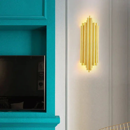 Modern gold led wall lamp with vertical cylindrical tubes in a symmetrical pattern for living room decorbites gold led lighting