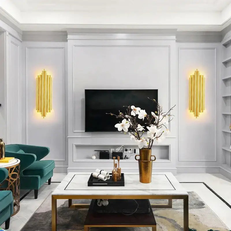 Modern gold led wall lamp with gold textured vase holding white orchids for living room decorbites gold led decor
