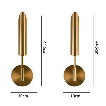 Brass-finished modern led wall lamp with sleek cylindrical design and spherical bulb for living room use