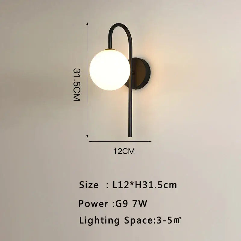Modern black metal led wall lamp with spherical frosted glass globe for stylish living room lighting