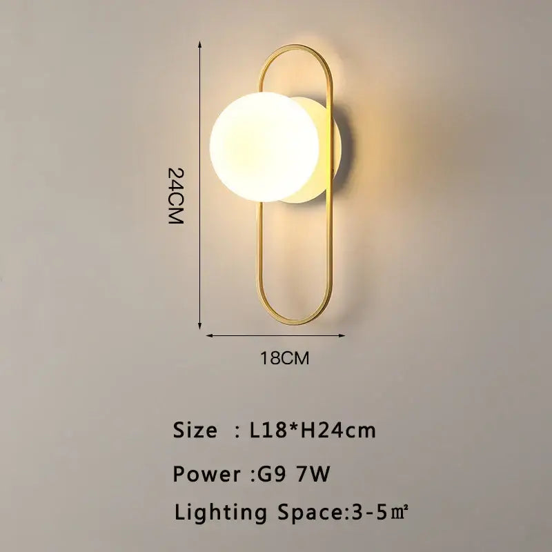 Modern gold led wall lamp with a gold-toned oval wall sconce and frosted glass globe for living room use