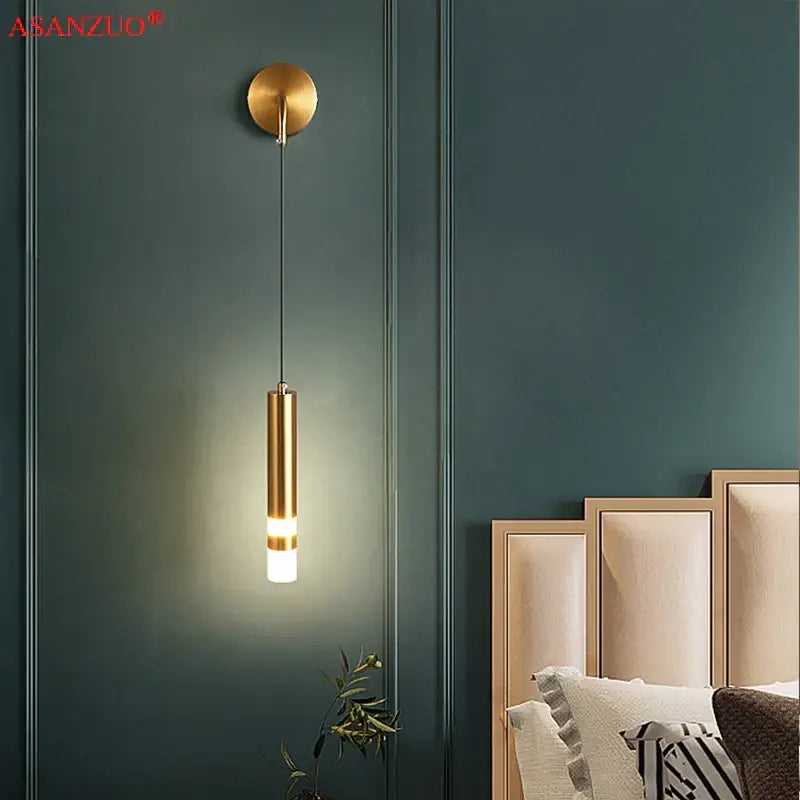 Modern gold led wall lamps featuring a cylindrical pendant with frosted glass diffuser for bedroom decorbites led wall lighting