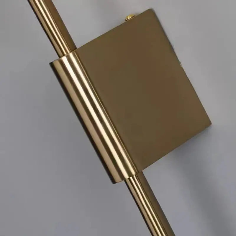 Brass-finished modern gold led wall light with frosted glass and a sleek rectangular face for bedroom use