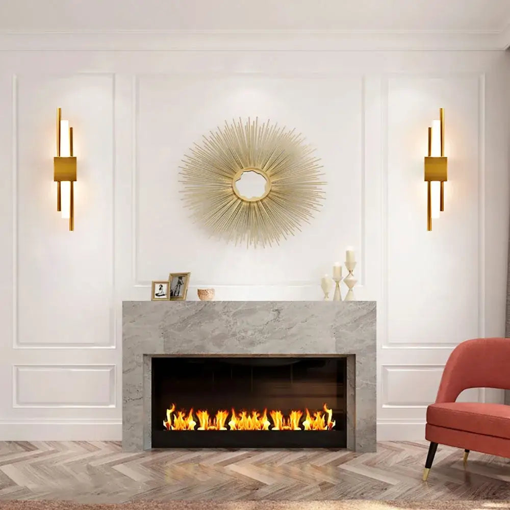 Modern gold led wall sconce with sunburst metallic rays and circular frame for bedroom ambient lighting decorbites led wall