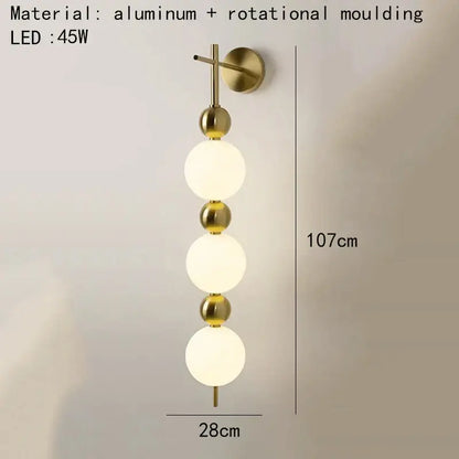 Modern gold led wall sconce with frosted glass spheres and aluminum accents for bedroom decorbites led wall sconce