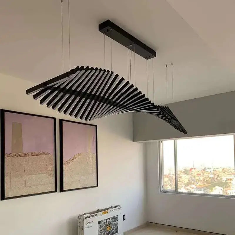 Modern gold led wave pendant chandelier featuring a black rectangular wave pendant chandelier made of sleek metal slats