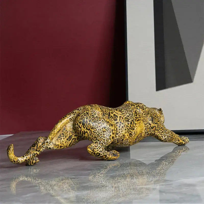 A sleek golden-yellow modern gold leopard resin statue with black rosettes crafted from glossy resin for living room decorbites leopard resin