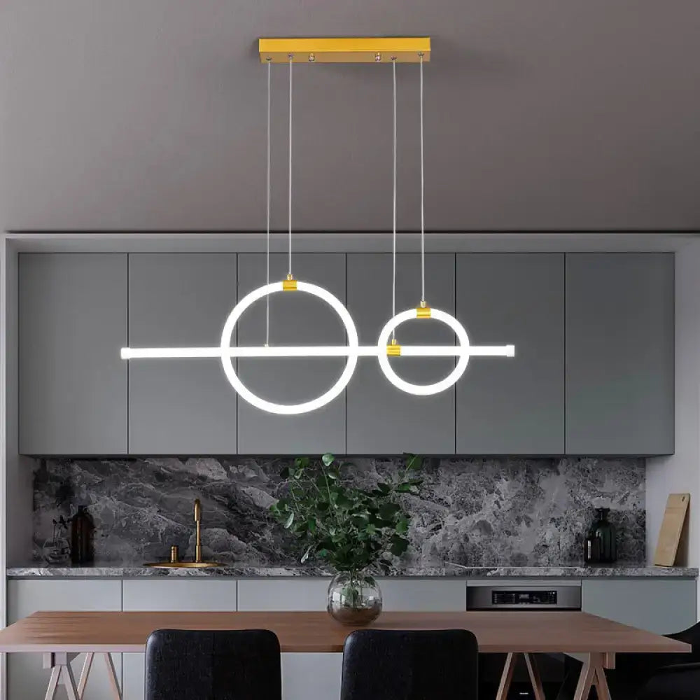 Modern minimalist decorbites gold linear and ring led pendant light with glowing white acrylic elements for dining room