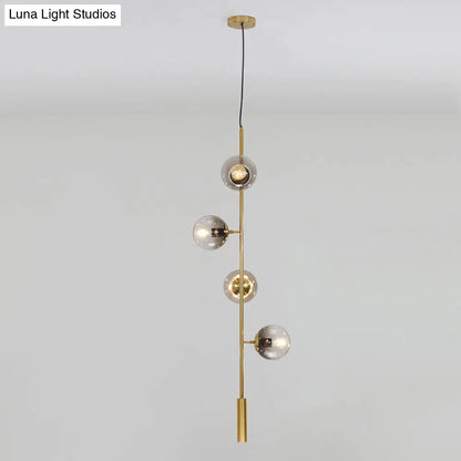 ثريا ديكوربايتس™ الحديثة باللون الذهبي الخطي مع ظلال زجاجية رمادية دخانية - تركيبات معدنية معلقة بأربعة مصابيح