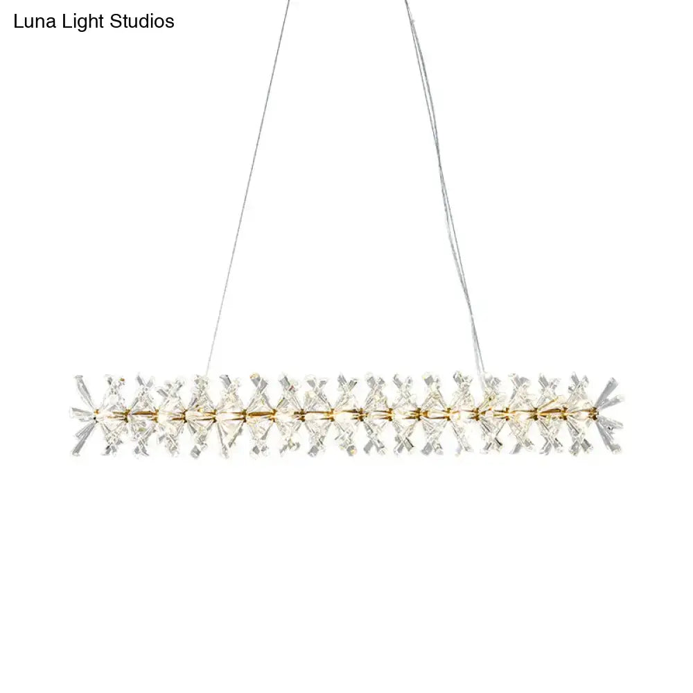 Modern gold linear crystal island lamp with clear prisms and metal accents for living room fixture width display