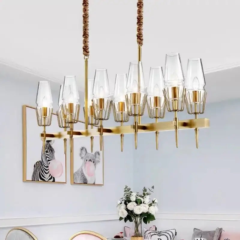 Modern gold lustre glass chandelier with clear glass shades and braided rope suspension for dining room decorbites gold lustre
