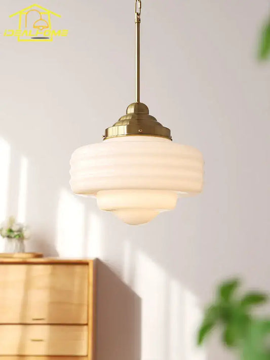 Brass-finished gold lustre pendant light with tiered frosted glass shade for modern kitchen decorbites gold lustre