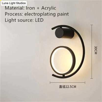 Modern gold luxury creative led bedside wall lamp with black iron and acrylic curved sconce design and led light source