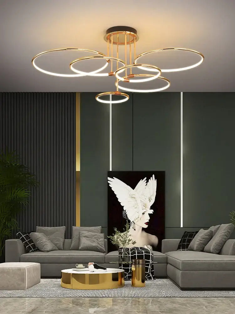 Modern gold luxury ring pendant chandelier with gold-toned circular LED design for dining room decorbites gold luxury