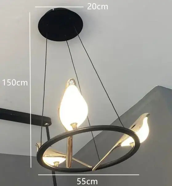Modern gold magpie bird ceiling chandelier featuring a black and gold bird-shaped pendant light with circular frame for living room decorbites gold magpie