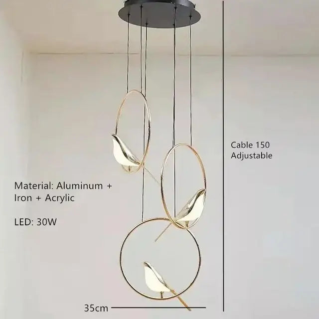 Modern gold magpie bird led chandelier pendant light with three circular frames and adjustable cables for dining room decorbites gold magpie