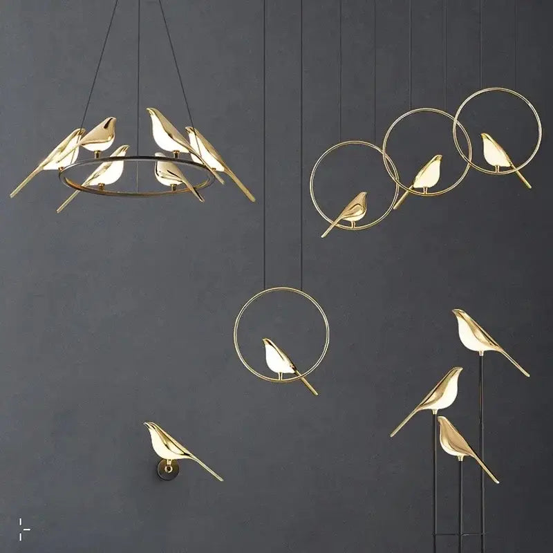 Modern gold magpie bird led chandelier with gold-toned bird-shaped pendant lights and circular wire frames for dining room decorbites gold magpie