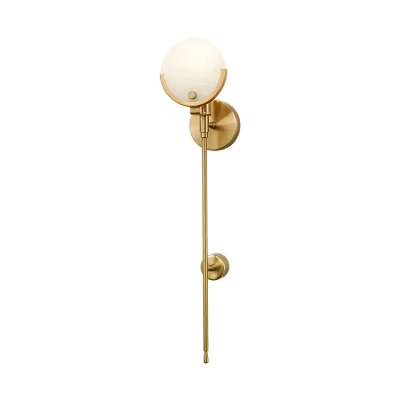 Modern gold marble wall lamp featuring a gold-toned wall sconce with frosted glass globe and slender rod decorbites gold marble