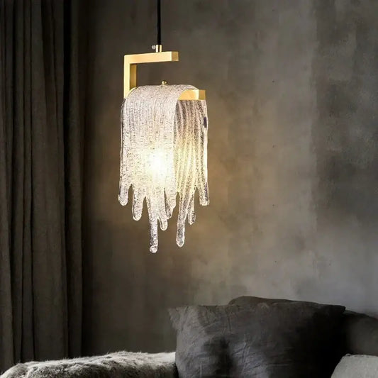 A modern gold pendant light with melting ice crystal led glass strands for elegant bedroom decorbites crystal led decor