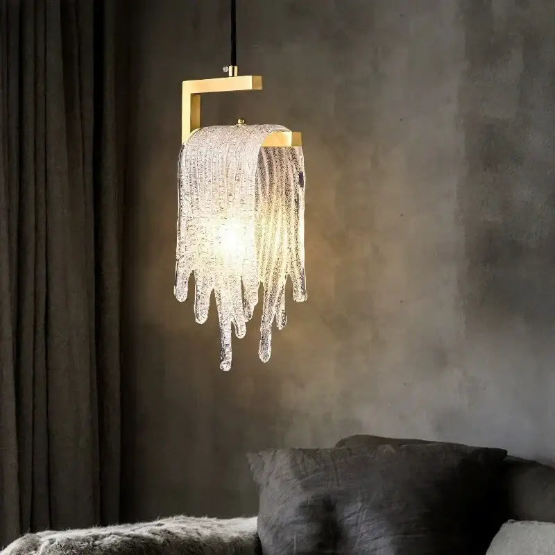 A modern gold pendant light with melting ice crystal led glass strands for elegant bedroom decorbites crystal led decor