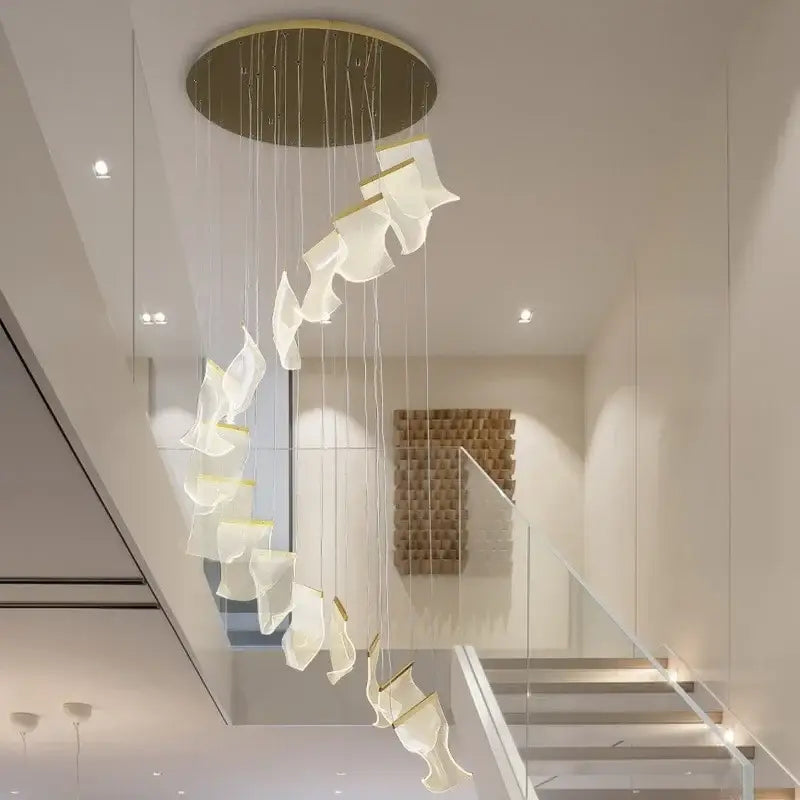 Modern gold mesh duplex building chandelier with cascading translucent white fabric shades and gold-toned accents