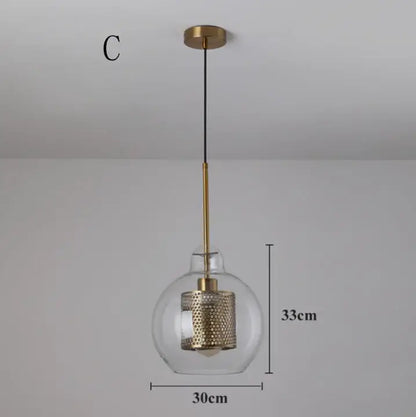 Modern gold mesh glass ball pendant light with clear glass globe and brass accents for kitchen dining room decorbites glass ball