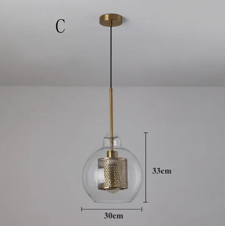 Modern gold mesh glass ball pendant light with clear glass globe and brass accents for kitchen dining room decorbites glass ball