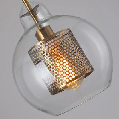 Modern gold mesh glass ball pendant light with clear glass globe and brass honeycomb shade for kitchen dining room decorbites pendant light