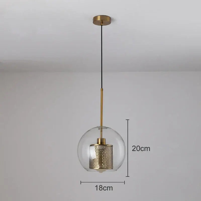 Modern gold mesh glass pendant light with clear glass globe, brass rod, and intricate honeycomb decorbites gold mesh shade