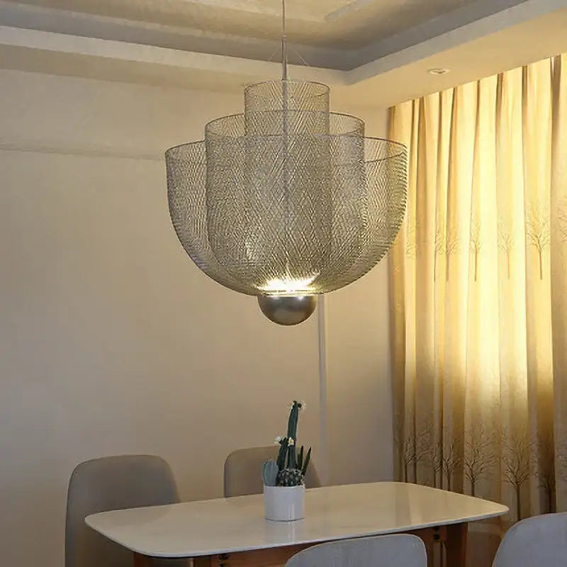 Modern gold mesh tiered dimmable led pendant light with a silver layered spherical design and polished metallic base