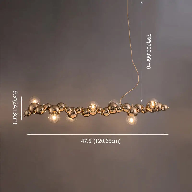 Modern gold metal arched ceiling light with six exposed bulbs and glass orbs for dining room illumination