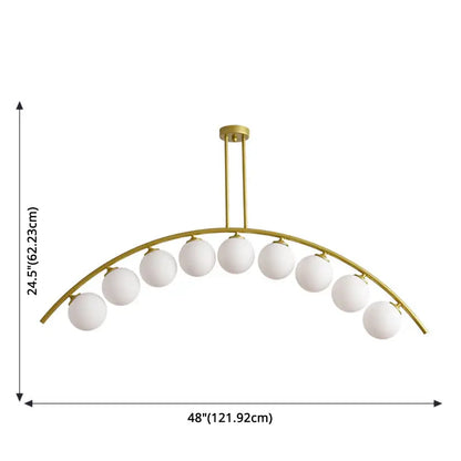 Modern gold metal arched ceiling light with nine white glass globes for dining room illumination