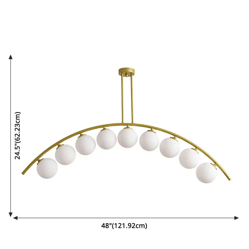 Modern gold metal arched ceiling light with nine white glass globes for dining room illumination