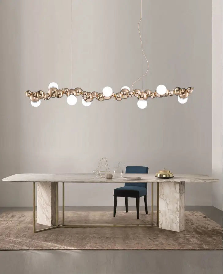 Modern gold metal arched ceiling light with 6 spherical bulbs for dining room featuring alternating gold and white finishes