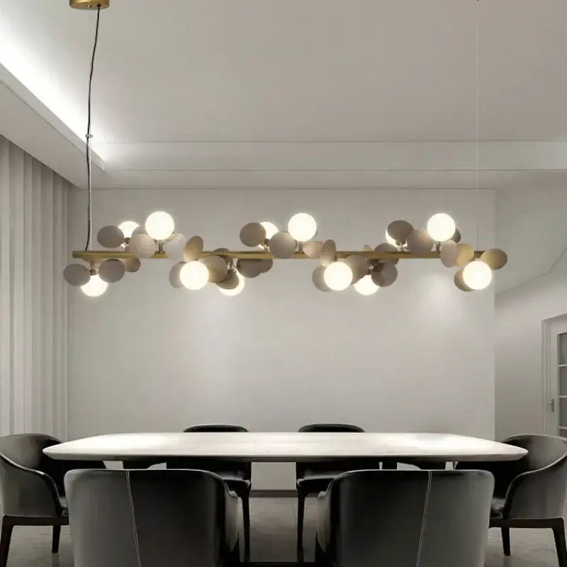Modern decorbites gold metal branching pendant light with spherical glass bulbs in white gray and gold for dining room decor