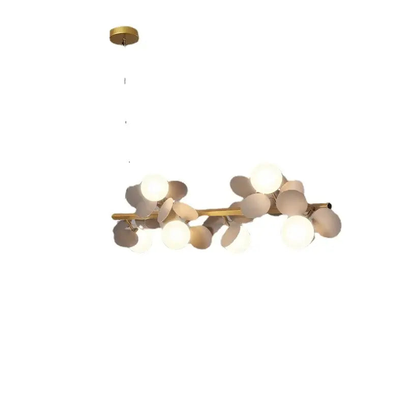 Modern gold metal branching pendant light with spherical frosted glass shades for dining room decorbites gold metal