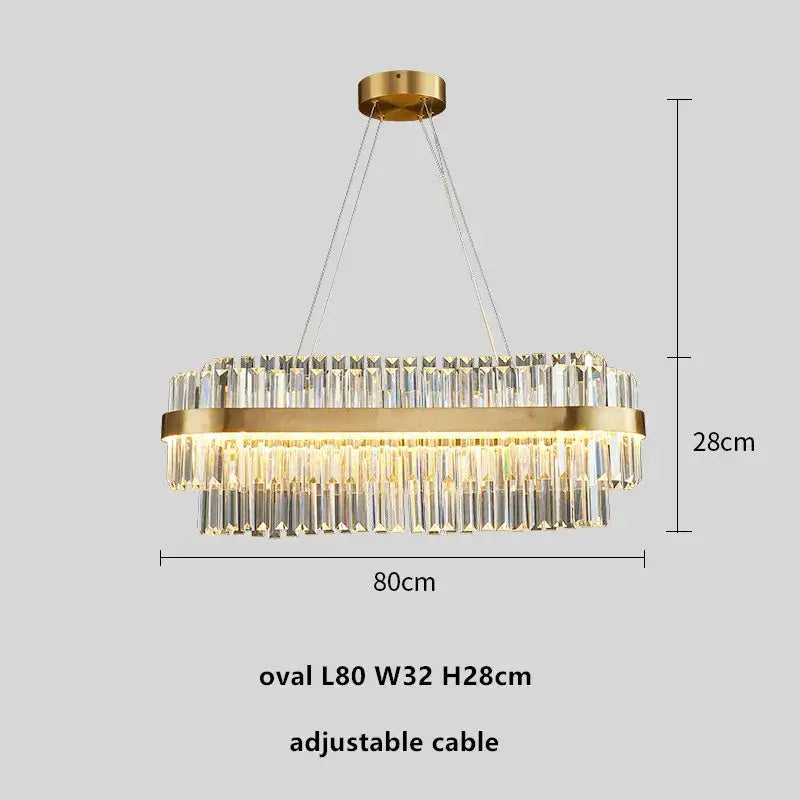 Modern gold metal crystal pendant light with gold-toned oval frame and cascading clear crystal prisms for dining room decorbites gold metal