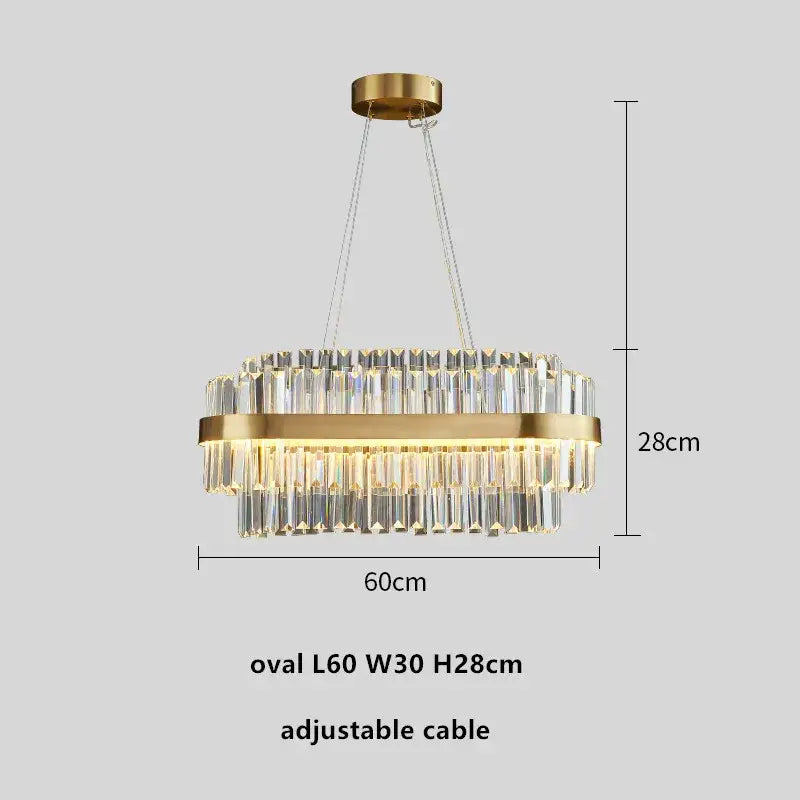 Modern gold metal crystal pendant light with gold-toned oval frame and cascading clear crystal prisms for dining room decorbites