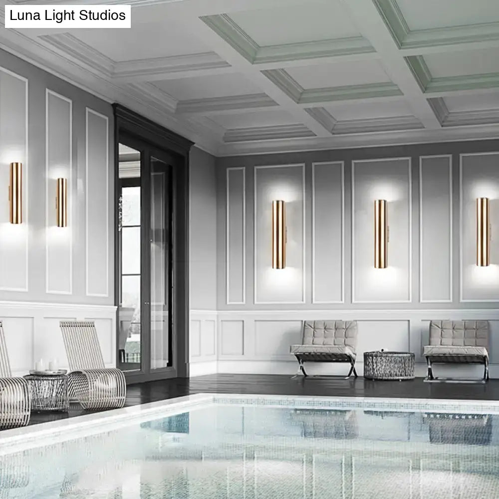 Modern gold metal fixture wall lamp with cylindrical design for corridor lighting and sleek interior decor