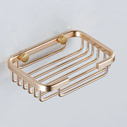 Modern gold metal glass soap dish with sleek rectangular design and rounded edges for bathroom wall mounted use