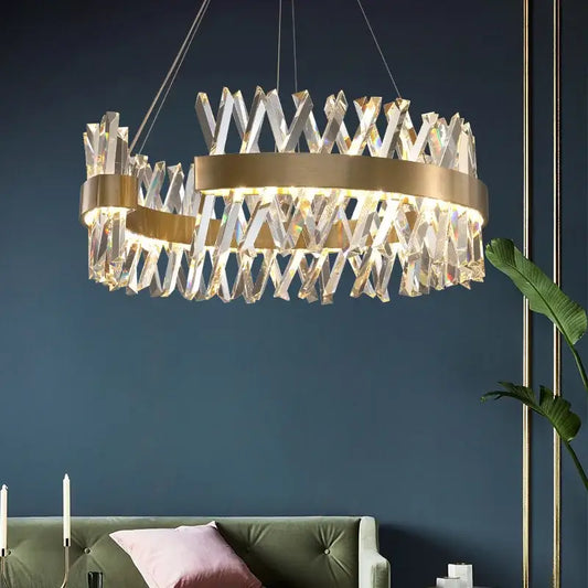 Modern gold metal s shape led pendant lamp with circular frame and cascading crystal prisms for luxury living room decorbites pendant lamp