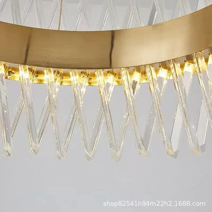 Modern gold metal pendant lamp with sleek s shape led design and cascading crystal prisms for luxury living room decorbites