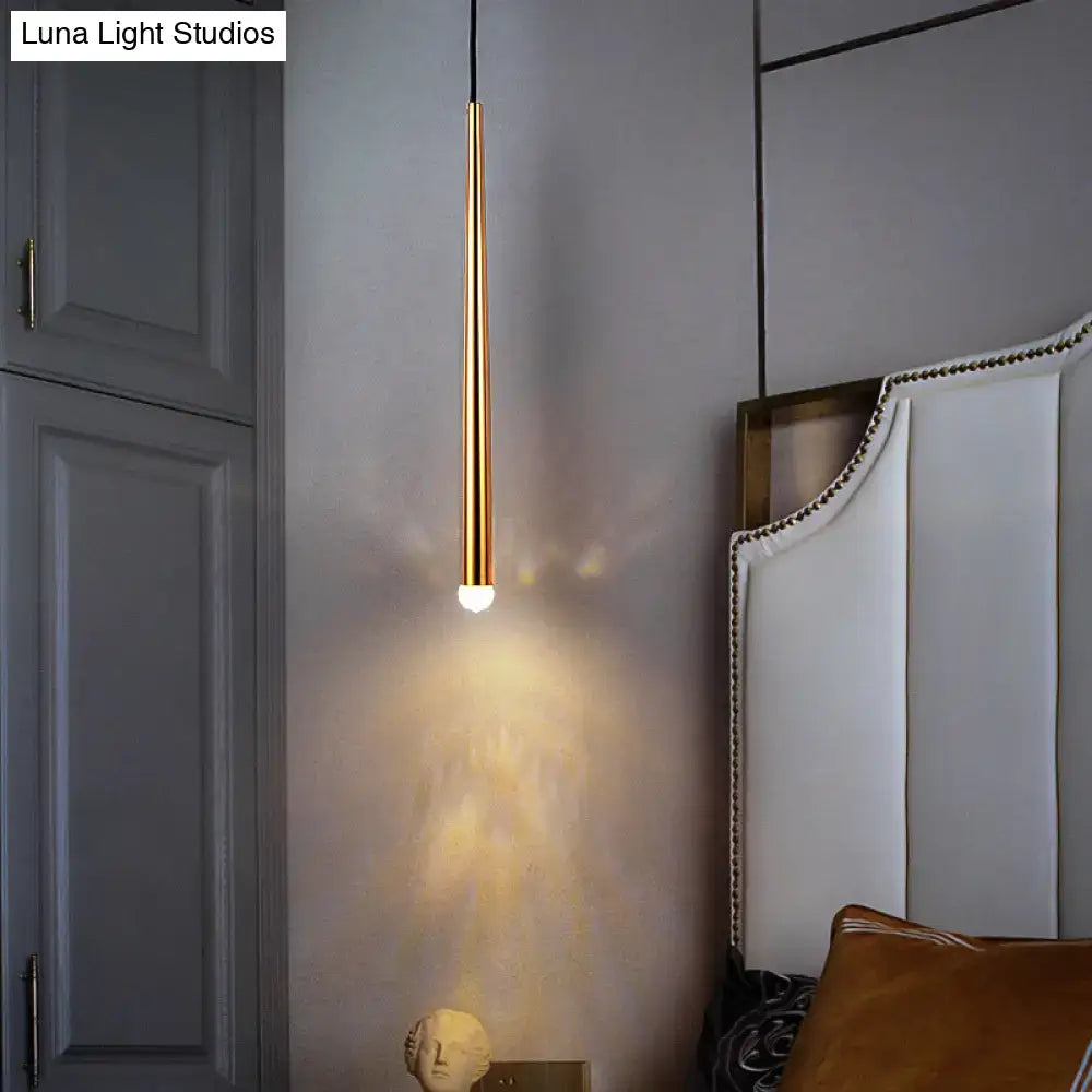 A modern gold metal shade led sconce with slender cylindrical design and warm glow for 110v-120v living room use