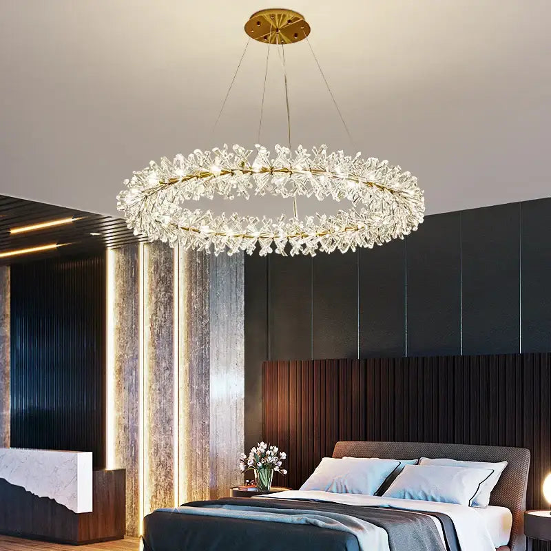 Elegant modern gold metal wire crystal chandelier with circular design and clear sparkling crystals for dining room lighting
