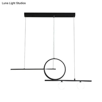 Modern black minimalist pendant light with geometric design and globe acrylic shade for dining room and kitchen